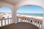 las palmas jerrys beach club condo 3 living room with kitchen view